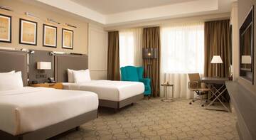 Фото номера Номер Делюкс с 2 двуспальными кроватями. Гостиница DoubleTree by Hilton  г. Казань 4