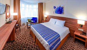 Фото номера Бизнес с двуспальной кроватью KING SIZE Гостиница Raymond г. Казань 4