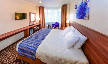 Фото номера Бизнес с двуспальной кроватью KING SIZE Гостиница Raymond г. Казань 2