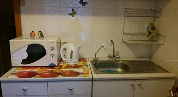 Фото номера Трехместный номер эконом-класса Гостевой дом Утро на Чистопольской г. Казань 5