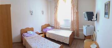 Фото номера Двухместный номер 5 категории однокомнатный с двумя раздельными кроватями Гостиница  Фатима г. Казань 3